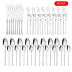 Goldoma stainless steel cutlery set with hammer pattern handles on a wooden table