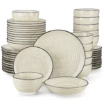 Vancasso handpainted dinnerware set in beige with spiral design on a wooden table