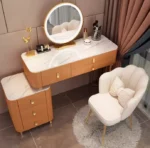 Modern dressing table with mirror and stool in a minimalist bedroom setup