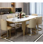 Modern oval marble dining table with gold stainless steel legs seating 6-8 people - Goldoma