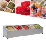 Stainless steel spice rack with 5 pans and lids on kitchen countertop