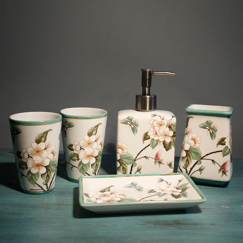 Flowers Ceramic Toothbrush Holder Storage Divided Bottle Bathroom Accessories Floral Mouthwash Cup Flowers ceramic toothbrush holder on bathroom counter, white with floral pattern, holding two toothbrushes.