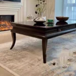 Minimalist coffee table with metal frame in a modern living room setting, Goldoma