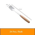 Stainless steel flatware set with wooden handles displayed on a table