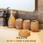 Toothbrush holder with three toothbrushes inside, morning bathroom setting.