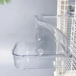 Cage-mounted bird bath tub attached to an outdoor birdcage door.