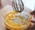 Transparent glass mixing bowl with fresh fruit salad
