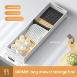 Kitchen drawer organizer with compartments for cutlery and utensils