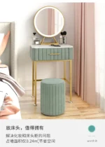 Marble top dressing table with lighted mirror and stool in a bedroom setting