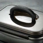 Large stainless steel food storage container with lid and handle for refrigerator organization