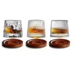 Rotating whiskey glass with wooden base on a bar table