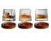Rotating whiskey glass with wooden base on a bar table