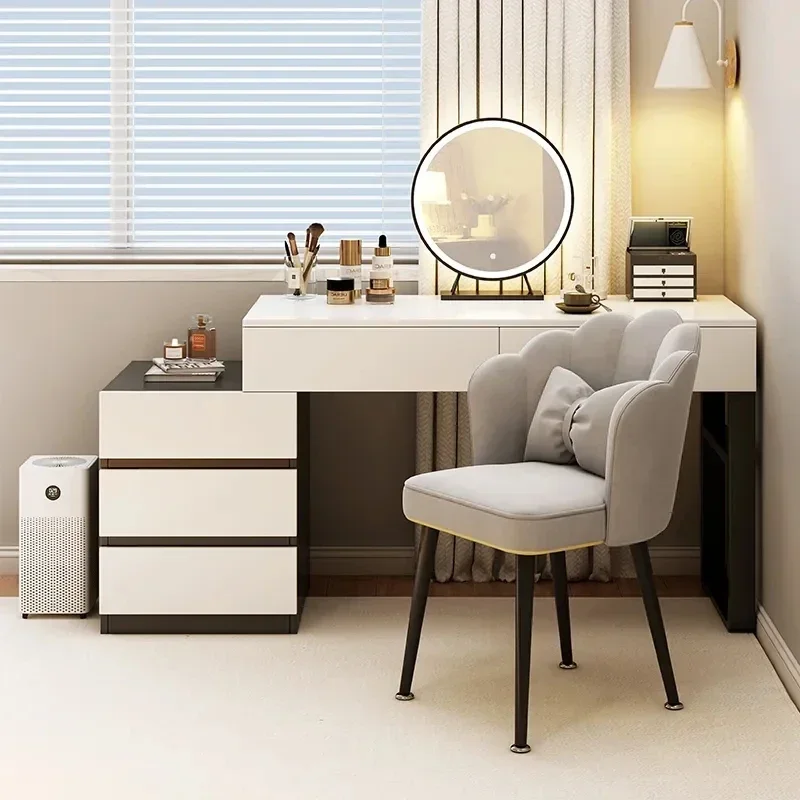 Sda30fe2f9a4d4a9d81c2d4360c1372d8U.webp Modern wooden dressing table with mirror and 5 drawers – makeup vanity desk with LED lights and stool in bedroom setting