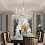 Elegant crystal chandelier illuminating a modern living room with sparkling light