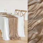 Boho cheesecloth table runner and napkins set as rustic table linens on a wooden table