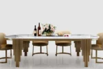 Modern oval marble dining table with gold stainless steel legs seating 6-8 people - Goldoma