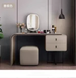 modern extendable dressing table with mirror and stool in a bedroom