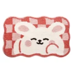 Non slip bathroom rug with frog and bear flocking design on bathroom floor