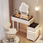 Luxury modern dressing table with mirror and stool in bedroom setting featuring compact vanity with drawers