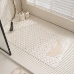 Washable bath mat with non-slip PVC surface in a modern bathroom