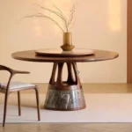 Round mobile dining table with caster wheels - space-saving solid wood table for small dining areas