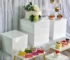 Set of 8 clear acrylic display risers for desserts, cosmetics, and gifts
