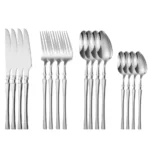 Goldoma 16-piece stainless steel silverware set with forks, knives, and spoons on a wooden table