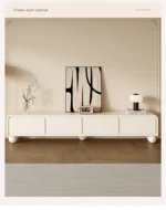 Nordic wood TV stand with drawers in a modern living room corner, featuring clean lines and ample storage