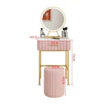 Marble top dressing table with lighted mirror and stool in a bedroom setting