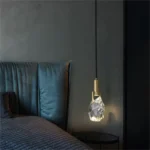 Modern crystal pendant lamp illuminating a dining room with elegant light refraction