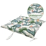 Outdoor bench cushion on a wooden garden bench with vibrant floral pattern