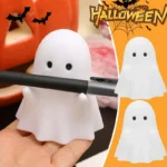 Halloween desk organizer holding pencils and markers, with a spooky backdrop.