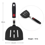 Goldoma high heat resistant spatula in use on a non-stick frying pan