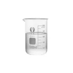 Borosilicate glass measuring cup with clear measurement marks on a kitchen counter