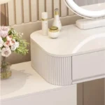 Modern storage vanity table with mirror and stool featuring multiple drawers for bedroom organization
