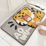 Non slip bathroom rug with frog and bear flocking design on bathroom floor