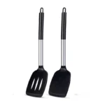 Goldoma silicone spatula set with two heat-resistant spatulas on a nonstick pan
