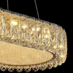 Luxury crystal chandelier illuminating a modern living room with sparkling light