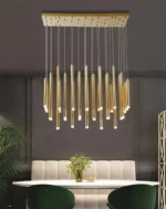 Chrome LED pendant light with opal glass globe in a contemporary living room.