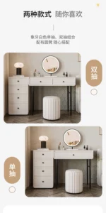 Modern minimalist makeup vanity table with mirror and stool in a bedroom setting
