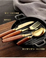 4-piece stainless steel flatware set with sapele wooden handles on a table