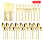 Goldoma stainless steel cutlery set with hammer pattern handles on a wooden table