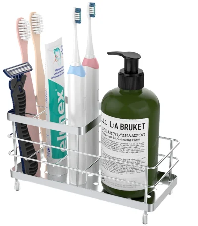 Luxspire stainless steel toothbrush holder on bathroom countertop, sleek silver finish with drainage holes visible.
