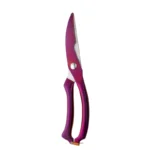 Goldoma heavy duty kitchen shears cutting through chicken bone on cutting board