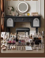 Goldoma compact vanity desk with drawer storage and mirror in a corner bedroom setting