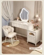 Modern wood makeup vanity table with mirror, drawer, and stool in a bedroom setting