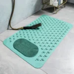 Oblong non-slip bath mat with suction cups on shower floor