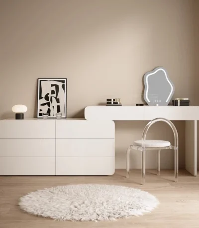 White minimalist wood dresser with mirror and stool in modern bedroom setting