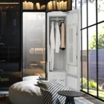 Goldoma smart electric clothes dryer with stainless steel finish and app control, drying clothes efficiently