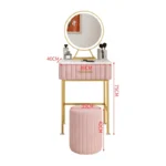 Marble top dressing table with lighted mirror and stool in a bedroom setting